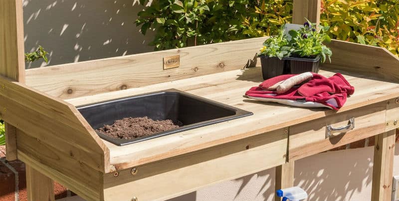 We compared over 20 potting benches and narrowed our search for the best potting bench to just 6 models, 4 wooden, some with metal tops and 2 all metal design.