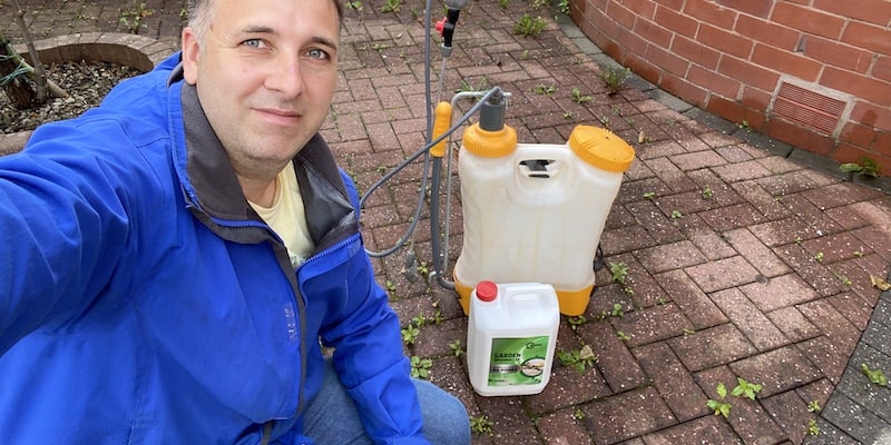 Image of Lemon juice spray bottle for pet friendly weed killer