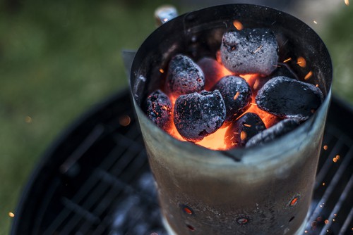Adding charcoal to bbq