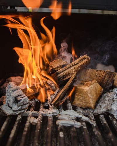 BBQ Brisket being Hickory Smoked on a chamber smoker