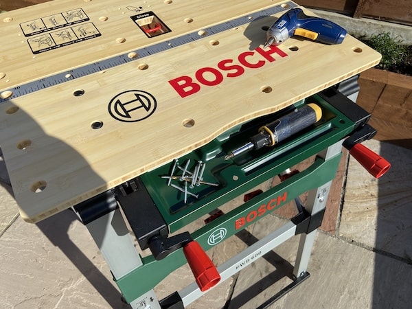 Bosch PWB 600 Portable Work Bench with built in storage tray with screws in
