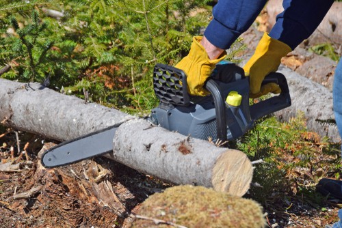 Cordless chainsaw being tested