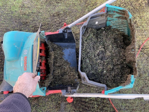 Moss collected using the Verticutter Lawnraker in the collection box