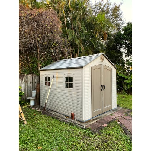 Low maintenance Plastic shed in garden