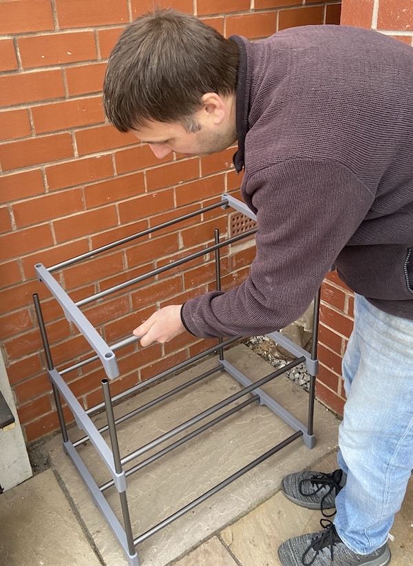 Add more section of mini grow house frame in place