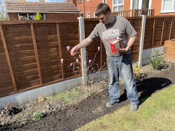Applying fertiliser to soil before laying turn