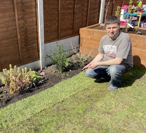 How to lay new turf against an existing lawn