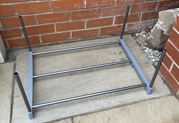First section of mini grow house frame bing put together