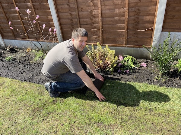 Laying new turf to extend lawn