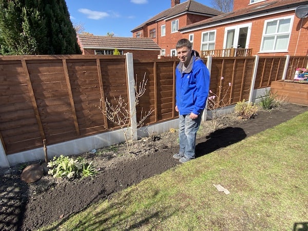 Tamping down soil when heels to remove any air pockets
