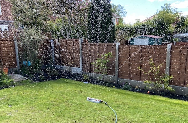 Costwise Pro Oscillating Bar Lawn Sprinkler watering my