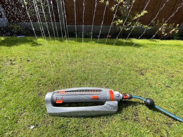 In the picture the sprinkler is set to water towards the right but not left of the sprinkler.