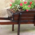 Best Wheelbarrow Planters and some top picks made from wood and metal