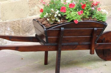 Best Wheelbarrow Planters and some top picks made from wood and metal