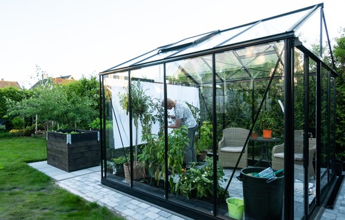Measuring your area to work out what size aluminium greenhouse to buy