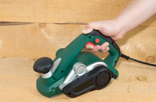 Corded electric planer which is more affordable than cordless models