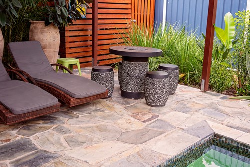 Rattan sun loungers with cushions