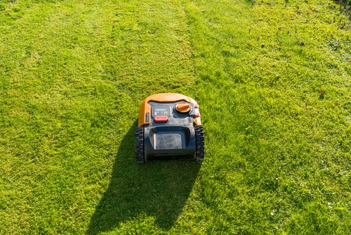 Lawn mowers mowing and keeping within the boundary wire it can sense and now cross