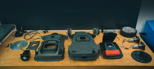 Dismantled robotic lawn mower or lawnmower