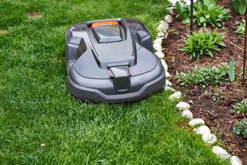 Robot lawnmowers mowing right to the edge of flowers beds and not damaging plants