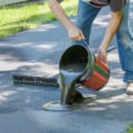 Tarmac drives and paths are low maintenance, however, they do fade but you can easily revive them and add extra protection by applying the best tarmac revivers.
