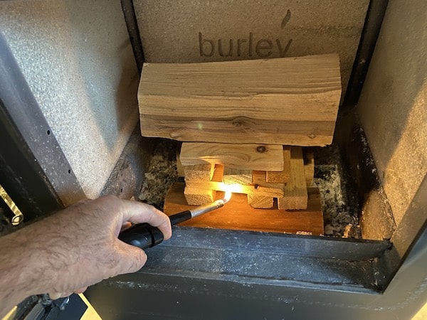 Light fire lighter under kindling