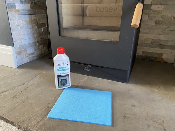 Stove cleaner for cleaning the glass on a wood burning stove