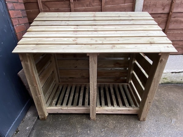 Fully assembled Cottesmore log store from front
