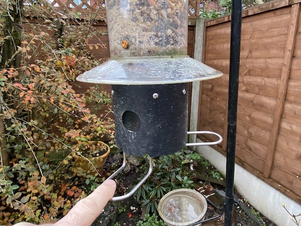 Spring-loaded perches close when too much weight is applied such as by a pigeon or other large bird