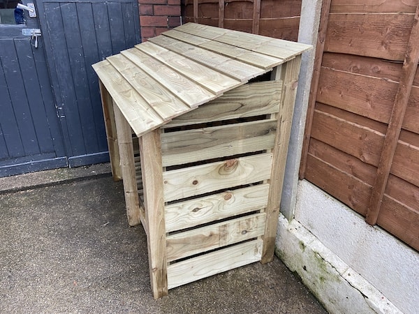 Fully assembled Cottesmore log store from side