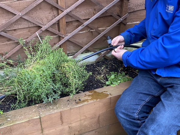 installing new water system in raised bed in my own garden for testing