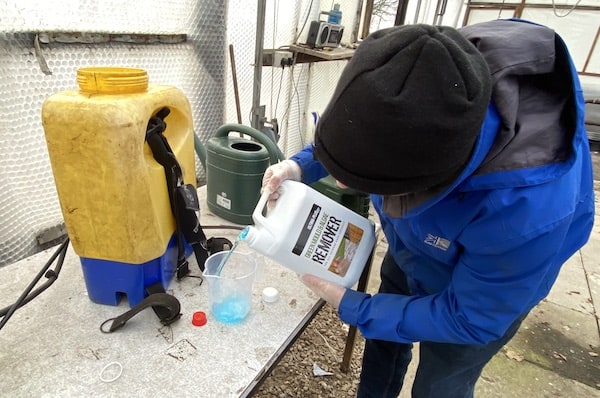 Mixing Ultima plus patio cleaner at 1 parts concentrate to 8 parts water