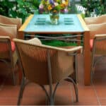 I review different kinds of the best rattan conservatory furniture sets – those with love-seats and matching chairs, those with two armchairs and a table, and those described as bistro sets.