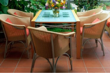 I review different kinds of the best rattan conservatory furniture sets – those with love-seats and matching chairs, those with two armchairs and a table, and those described as bistro sets.