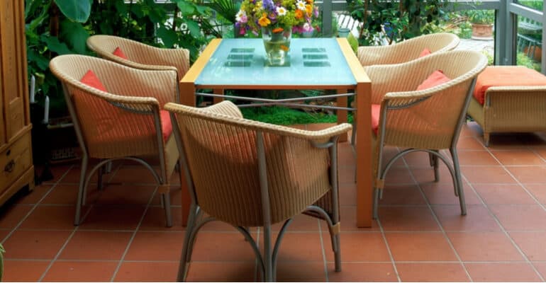 I review different kinds of the best rattan conservatory furniture sets – those with love-seats and matching chairs, those with two armchairs and a table, and those described as bistro sets.