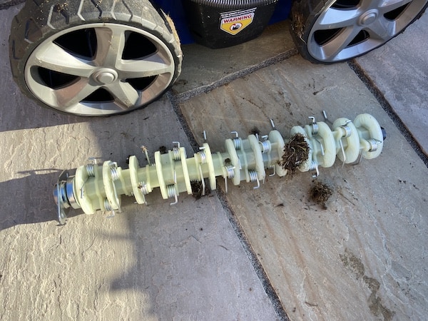 Lawn raker attachment that can be swapped out for steel blade alternatives