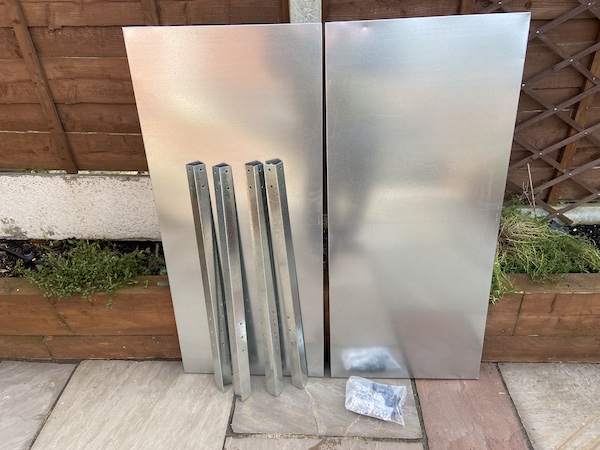 Palram Greenhouse Steel Work Bench as it comes before assembly