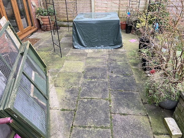 Patio before spraying with ULTIMA-PLUS XP Patio Cleaner