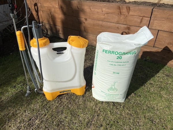 Ferromel-20 which is what I use to control moss on lawns, also known as iron sulphate & Ferrous sulphate - What the professionals use!