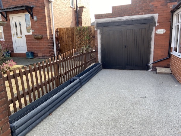 Garage door and troughs both painted with the Wagner paint sprayer