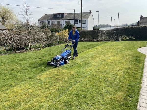 Mowing the front lawn, the smallest lawn on the properly