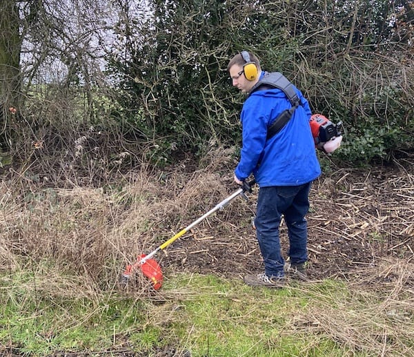 Testing strimmer attachment of the BU-KO 52cc Long Reach Petrol Multi Functional Garden Tool