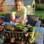 After recently planting up this strawberry planter and alpine rockery planter , I decided to plant two new window troughs with summer basket plants so I decided to put together this guide