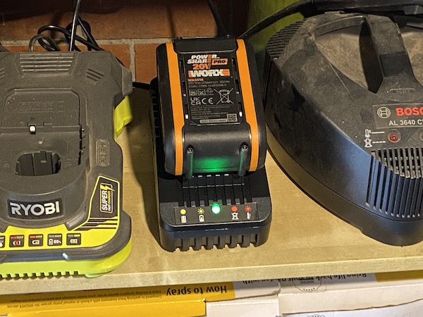 The 20v Max 4Ah battery and fast charger that came with the WORX WG730E Brushless Cordless 30cm Lawn Mower