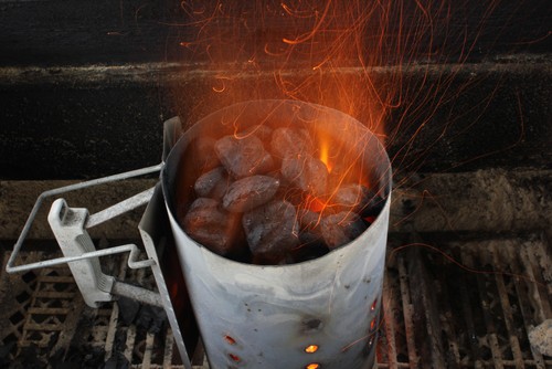 Using a chimney starter to get the coats hot and ready to add to the bbq in minutes