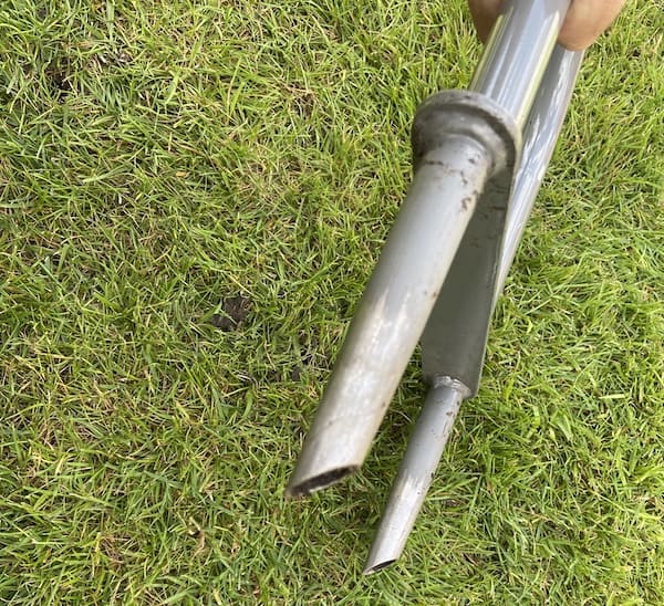 Angled tines on aerator making cutting into grass easier