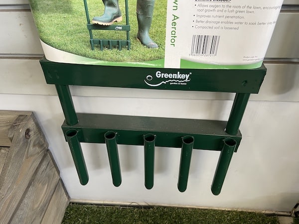 Lawn aerator with 5 hollow tines which can be difficult to push into lawns that are not soft enough