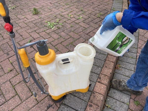 Pouring WEEDKIL Garden Weedkiller into my garden sprayer