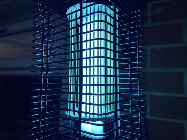The blue UV light emitted from the electric fly catcher attacts small flys and bugs