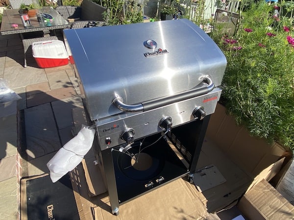 Putting BBQ unit onto cabinet